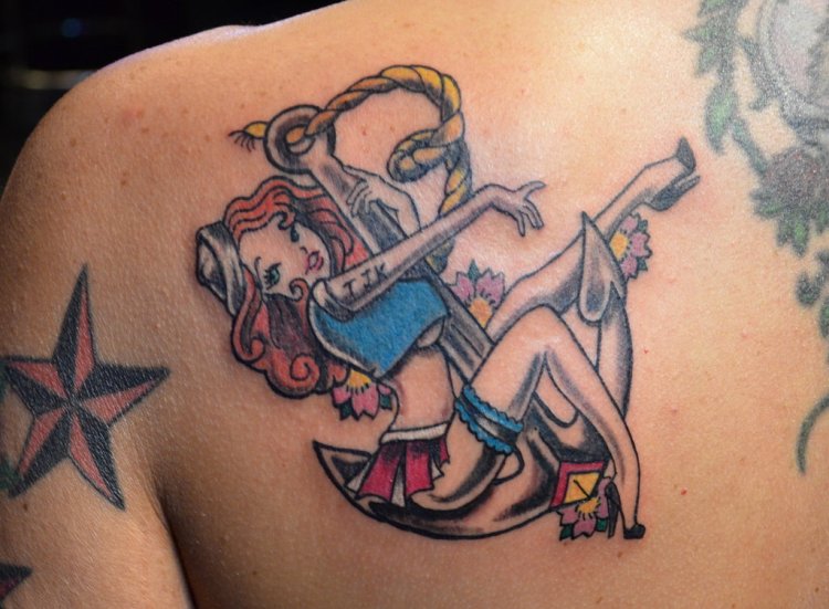 sailor_gir_pin_up_tattoo_on_back_shoulder