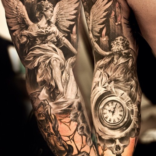 grey_ink_angel_and_pocketwatch_tattoo_on_sleeve